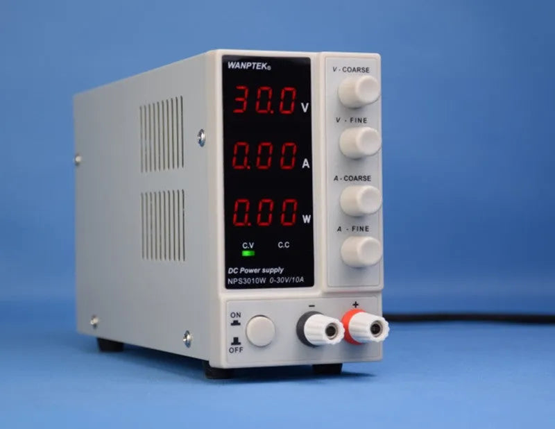 White NPS605W adjustable bench power supply with digital display for electronics testing and repair.