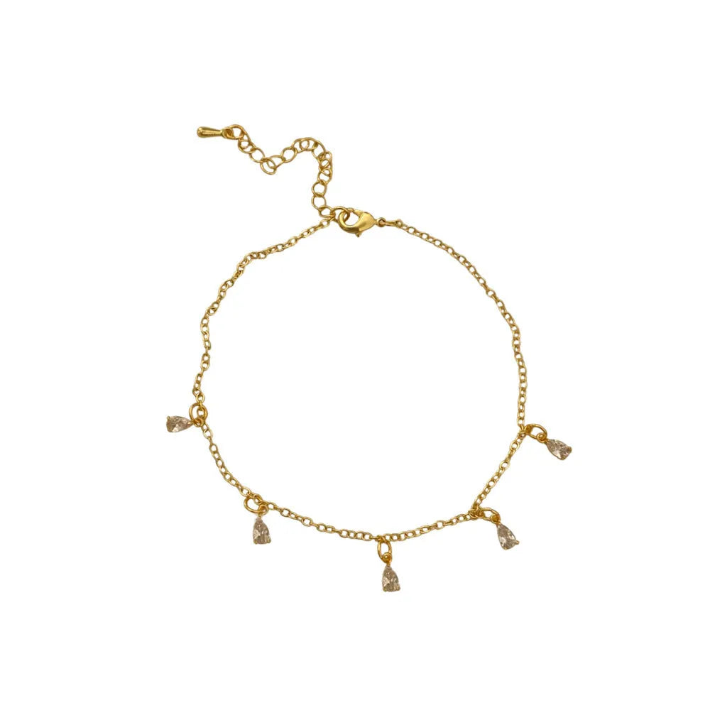 Zircon geometric necklace, earrings, and anklet set with meteor shower detail on a white background.
