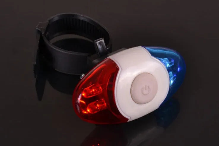Red and blue LED bicycle tail light with adjustable mounting base in horizontal and vertical positions