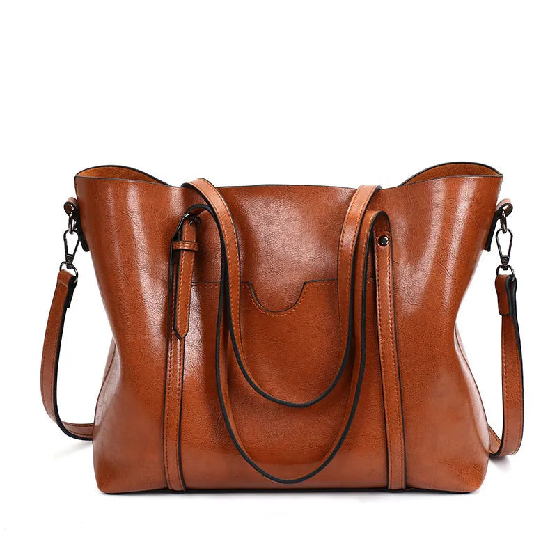 Retro messenger bag for women in PU leather with large A4 capacity and shoulder strap