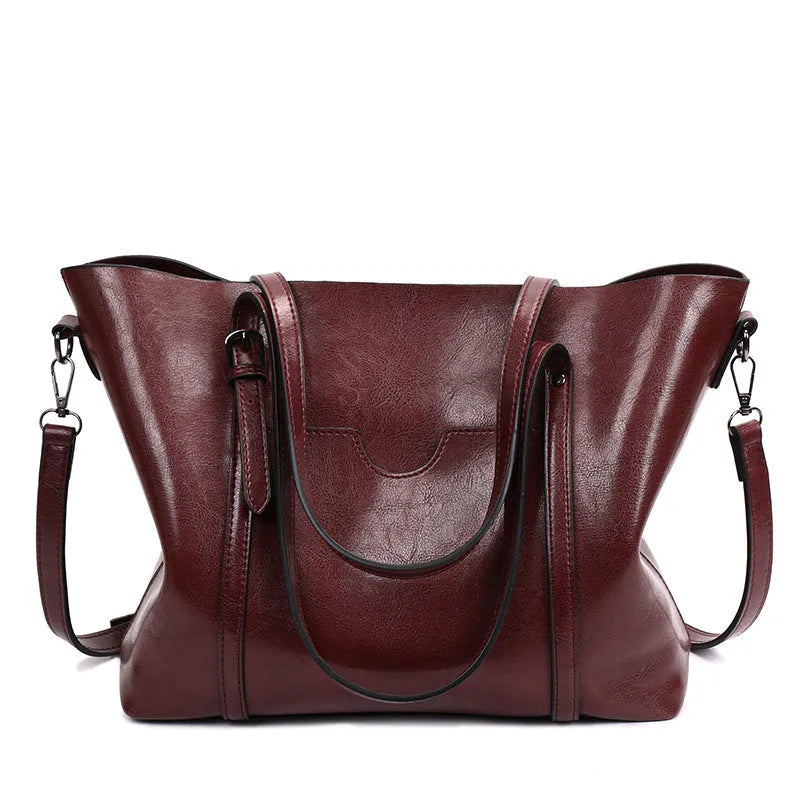 Retro messenger bag for women in PU leather with large A4 capacity and shoulder strap