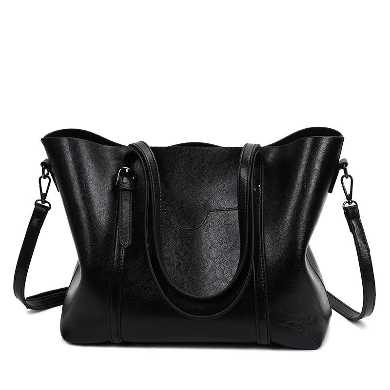 Retro messenger bag for women in PU leather with large A4 capacity and shoulder strap
