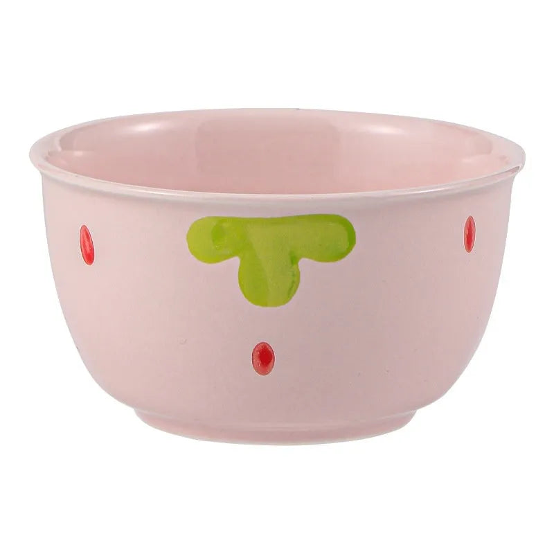 Cute strawberry design porcelain dinnerware set with flower bowls, straw hat plates, and a twist spoon.