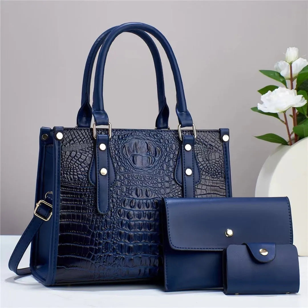 Contrast colour three-piece PU bag set showing crossbody bag, wallet, and card holder in burgundy.