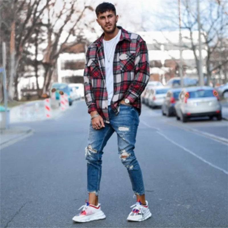 Deep blue cotton men's jeans laid flat, available in sizes S to 3XL.