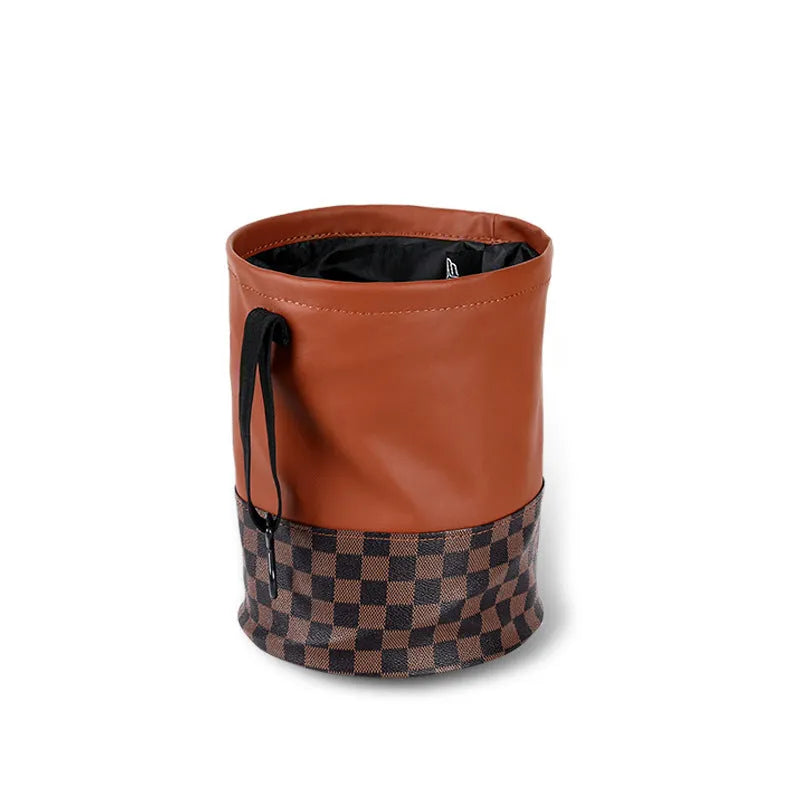 Black leather retractable foldable car trash can with handle shown open and folded.