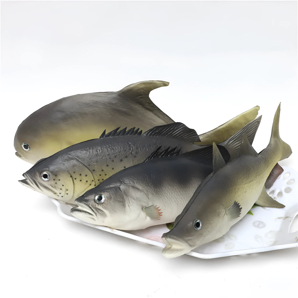 Set of three detailed PU simulated fish models: yellow-fin tuna, small tuna, and yellow croaker on a white background.
