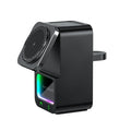 White Bluetooth speaker wireless charging station with magnetic phone holder on desk
