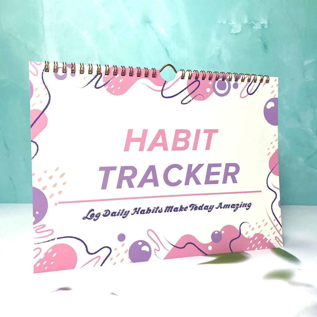 English habit tracking planner with 12 pages in pink white, purple white, flower white or yellow white covers