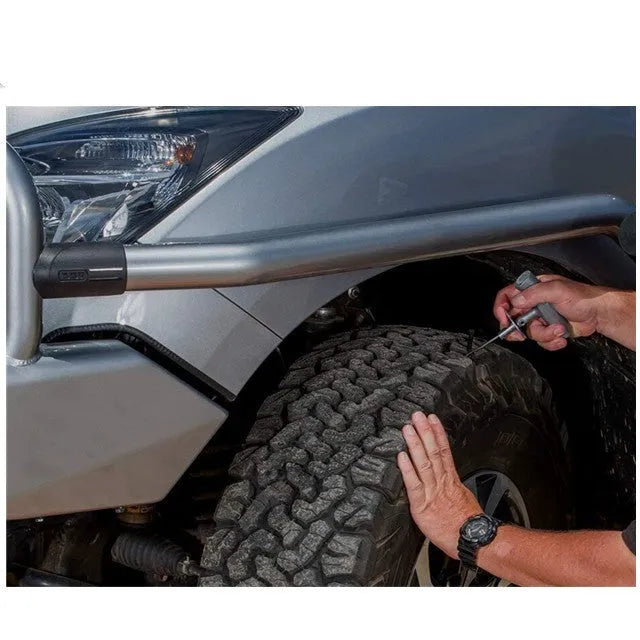 Speedy Seal emergency car tyre repair tool kit with tools laid out next to its high-visibility compact case.