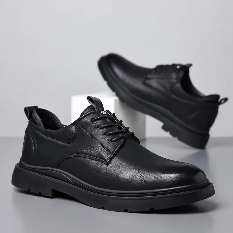 Men's black and brown leather sneakers with cowhide uppers and rubber soles