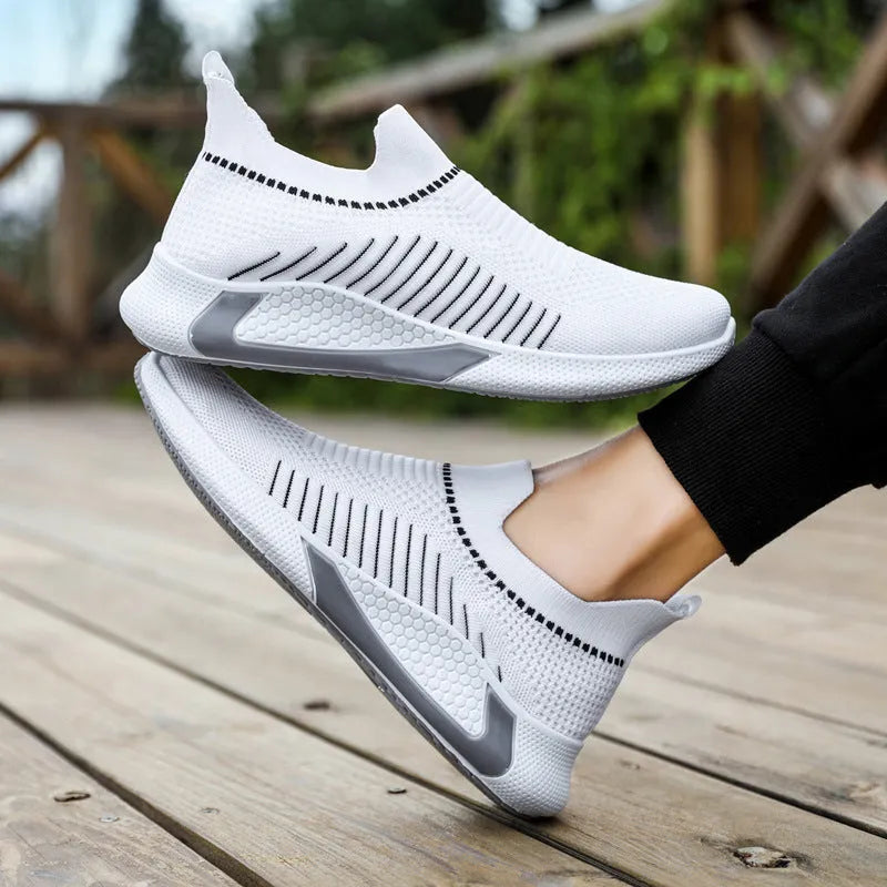 Men's black and white mesh sock sneakers with a striped design and lace-up front.