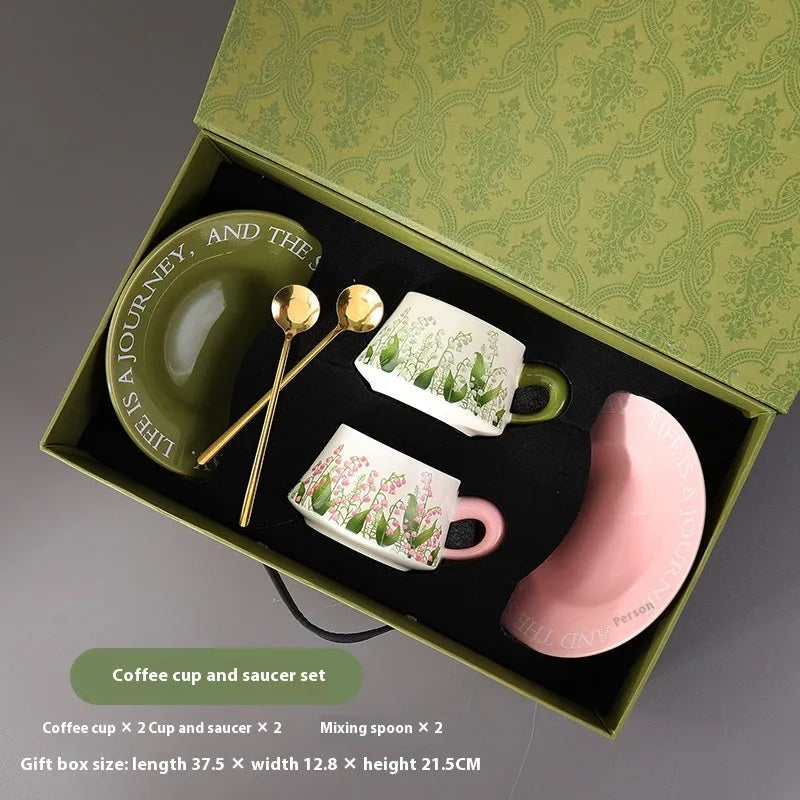 Ceramic coffee cup and saucer set with 300ml capacity cups and matching stirring spoons