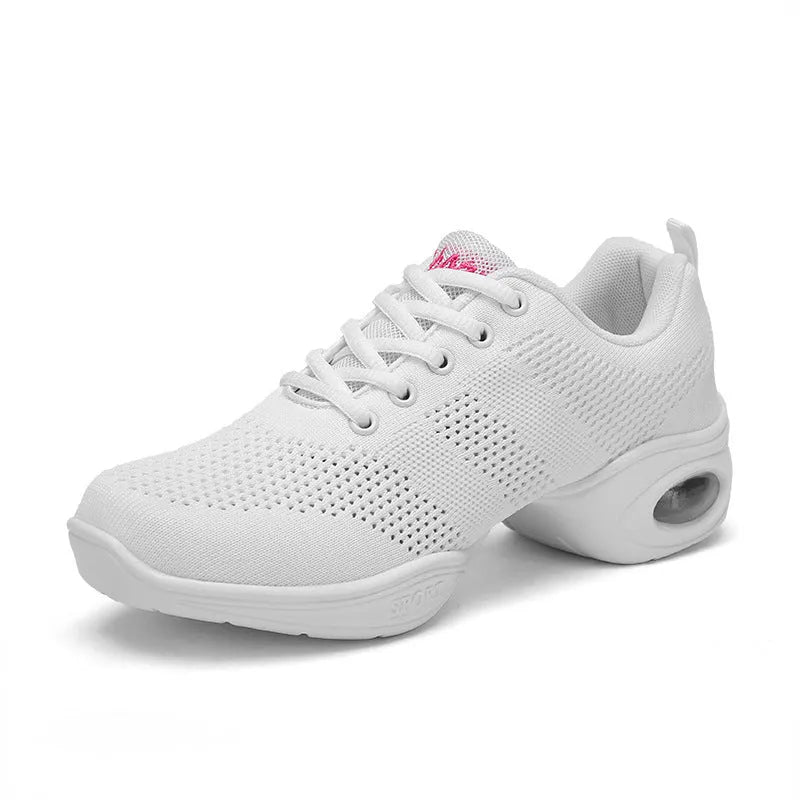 Women's white breathable flyknit mesh dancing shoes with a soft PU sole on a light background.