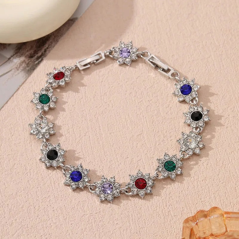 Floral-shaped zinc alloy bracelet with electroplated finish in gold and silver colour options.