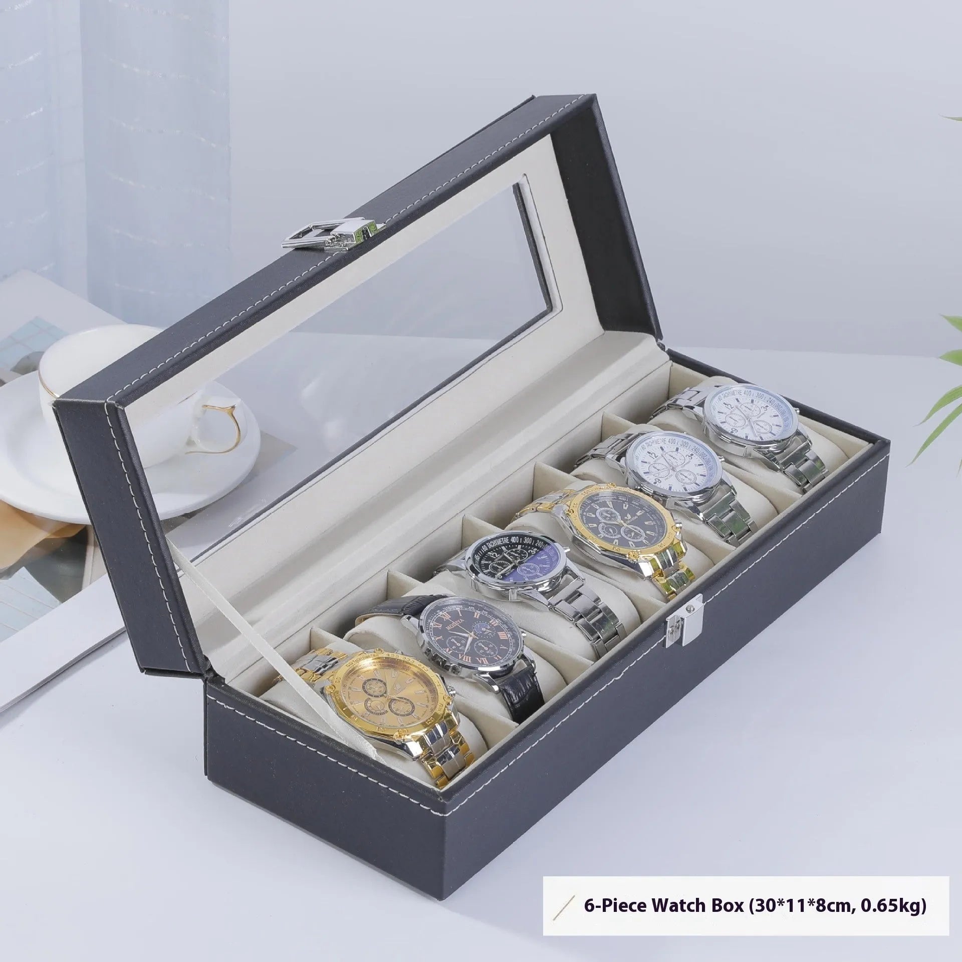 Grey high-grade leather watch storage box with see-through lid for dust protection.