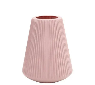 Melamine plastic decorative vase 16cm diameter in blue colour on wooden desktop