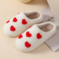 Plush home slippers with cartoon designs and non-slip PVC soles in adult female sizes