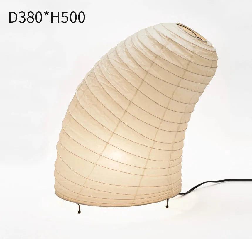 Handmade Nordic-style table lamp with a Japanese rice paper shade and aluminium base on a wooden table