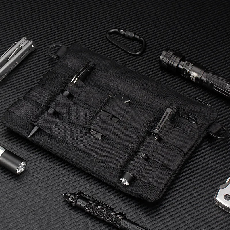 Black Oxford cloth military utility bag measuring 18 by 3.5 centimetres