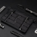 Black Oxford cloth military utility bag measuring 18 by 3.5 centimetres
