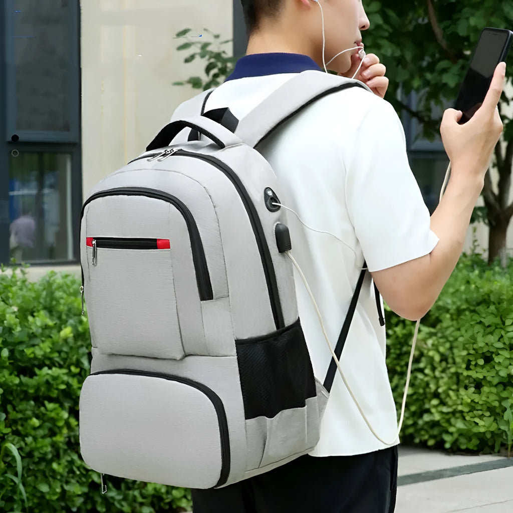 Oxford cloth insulated backpack with curved shoulder straps showing dry-wet separation compartments and 36-55L capacity