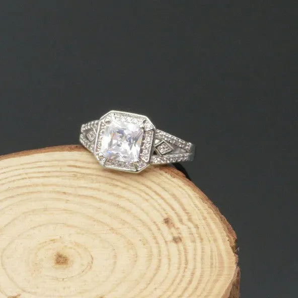 Women's geometric zircon ring with hollow ornamental design and quadrilateral pattern in platinum colour