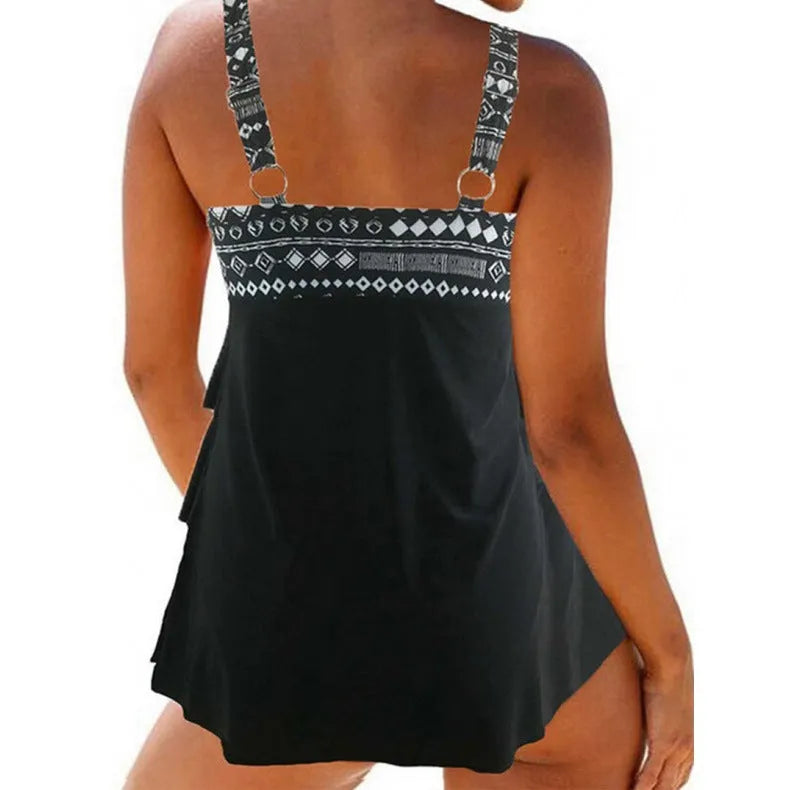 Plus-size women's swimsuit with double shoulder straps and a front bow, shown in available colours.