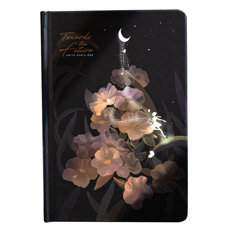 A5 size diary book with a luminous purple cover, open to show pages with colour illustrations.