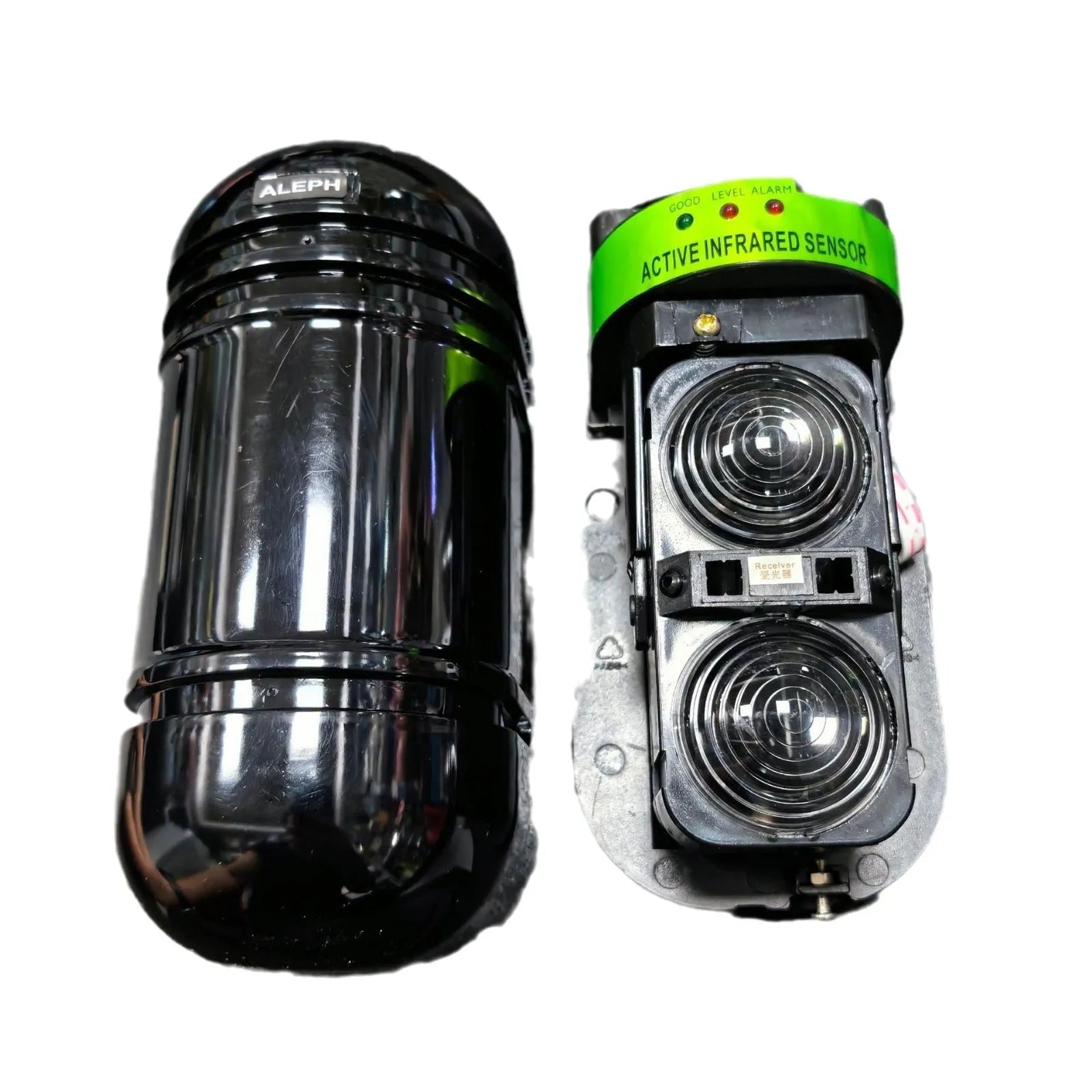 A pair of black wall-mounted infrared security detectors with wired terminals.