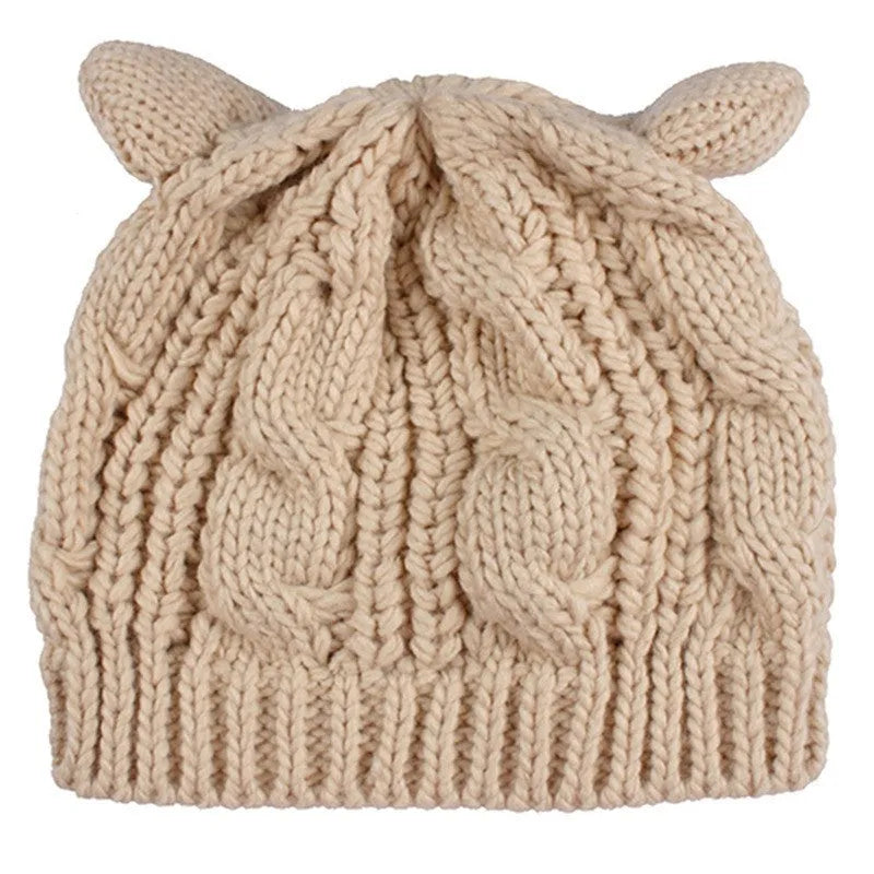 Handmade knitted cat ear beanie in red colour showing 3D ear design