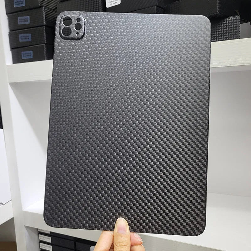 Carbon fibre hard protective case for Apple iPad Pro 11 showing embossed plaid pattern and choice of surface finishes.