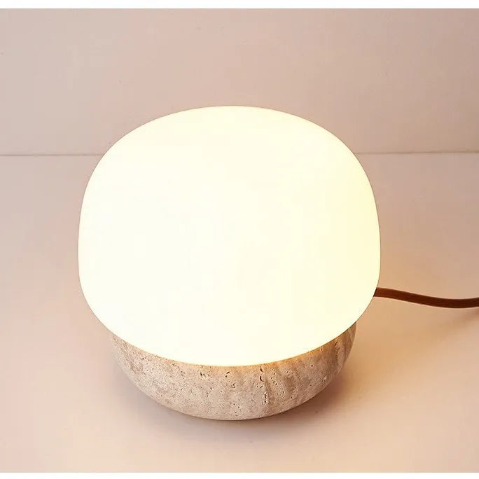 Cream coloured retro bedside lamp measuring 18x17cm with button switch and warm bulb illumination