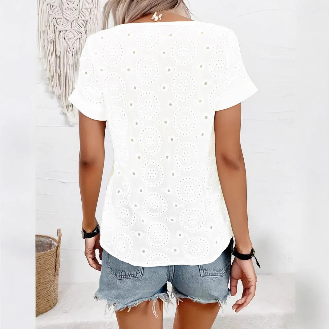 White women's V-neck T-shirt with hollow-out detail and short sleeves, loose casual fit.