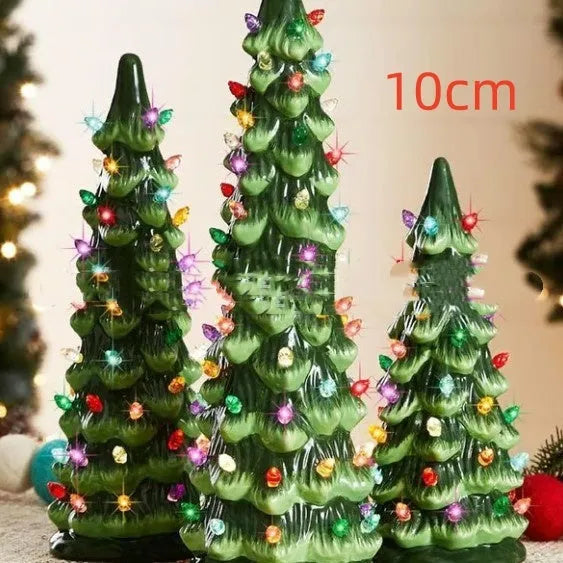A decorative resin Christmas tree ornament with built-in LED lights, shown in European style.