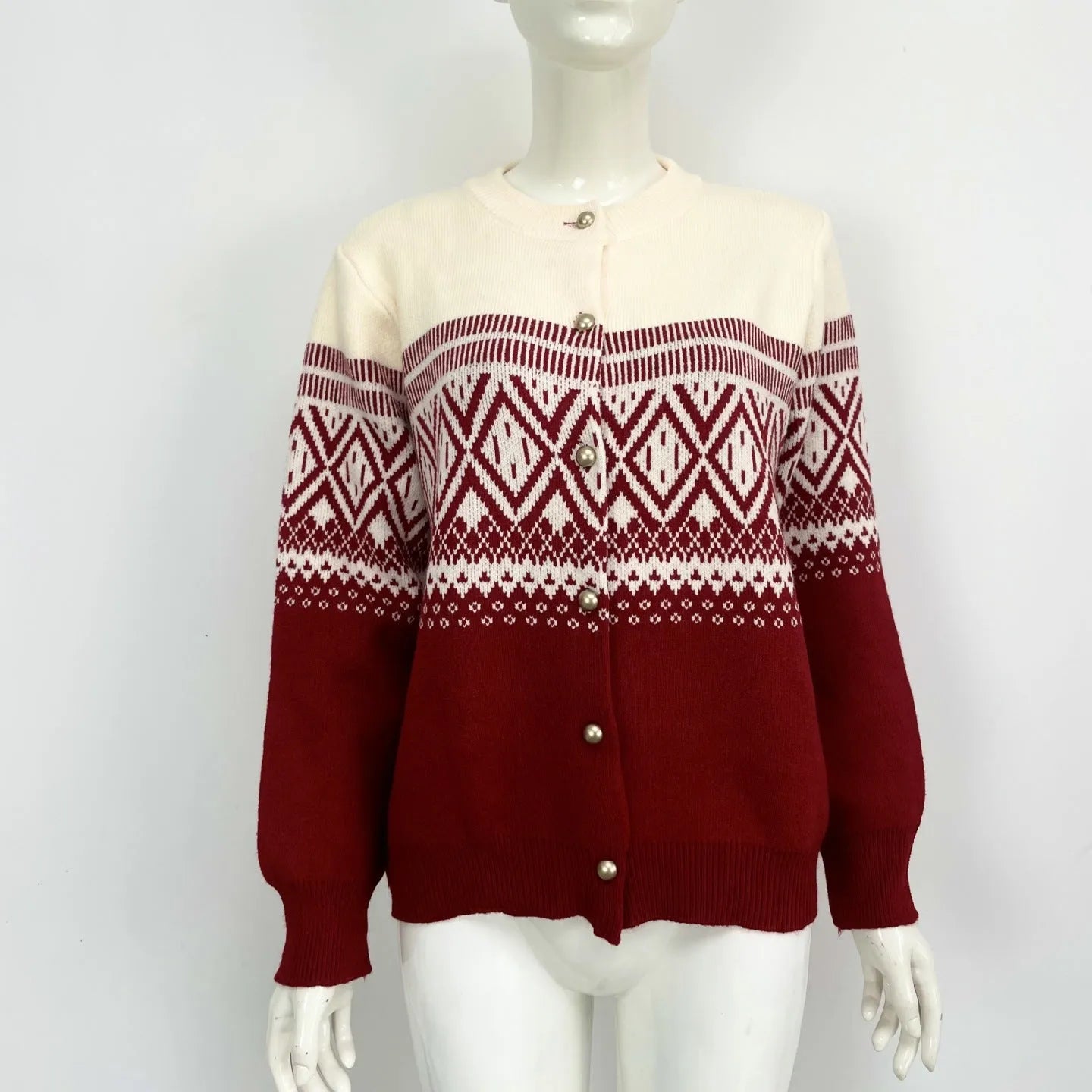 Women's red alpaca wool cardigan with grey diamond knit pattern and long sleeves