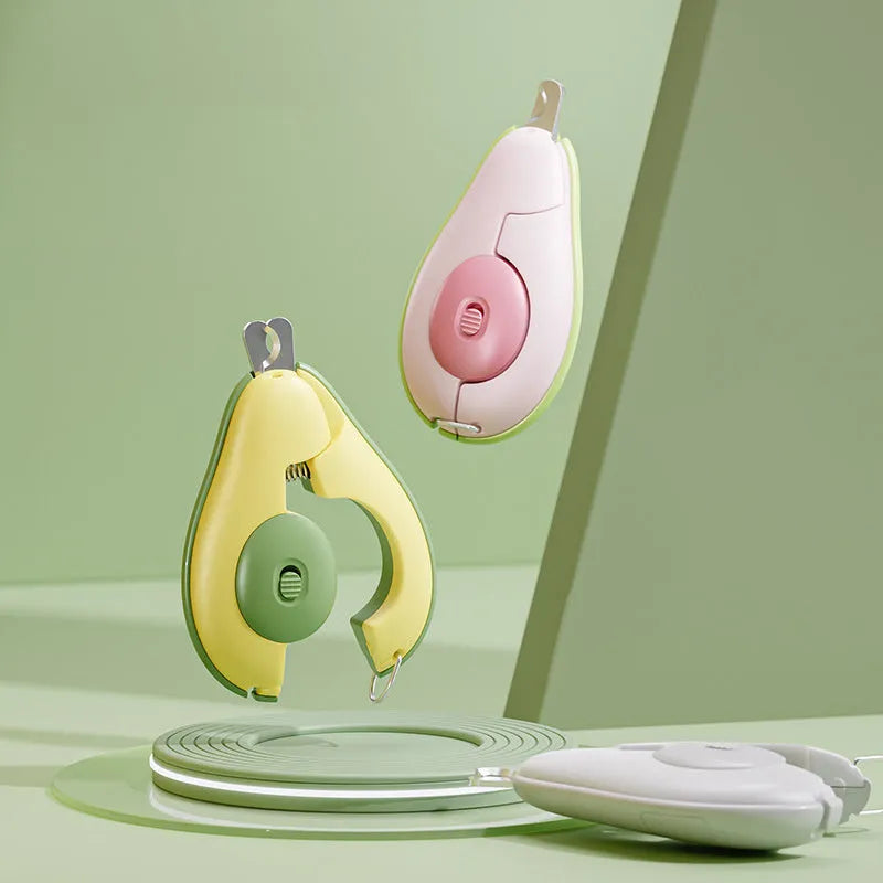 Professional LED pet nail clipper for small dogs and cats in green, pink, and white.