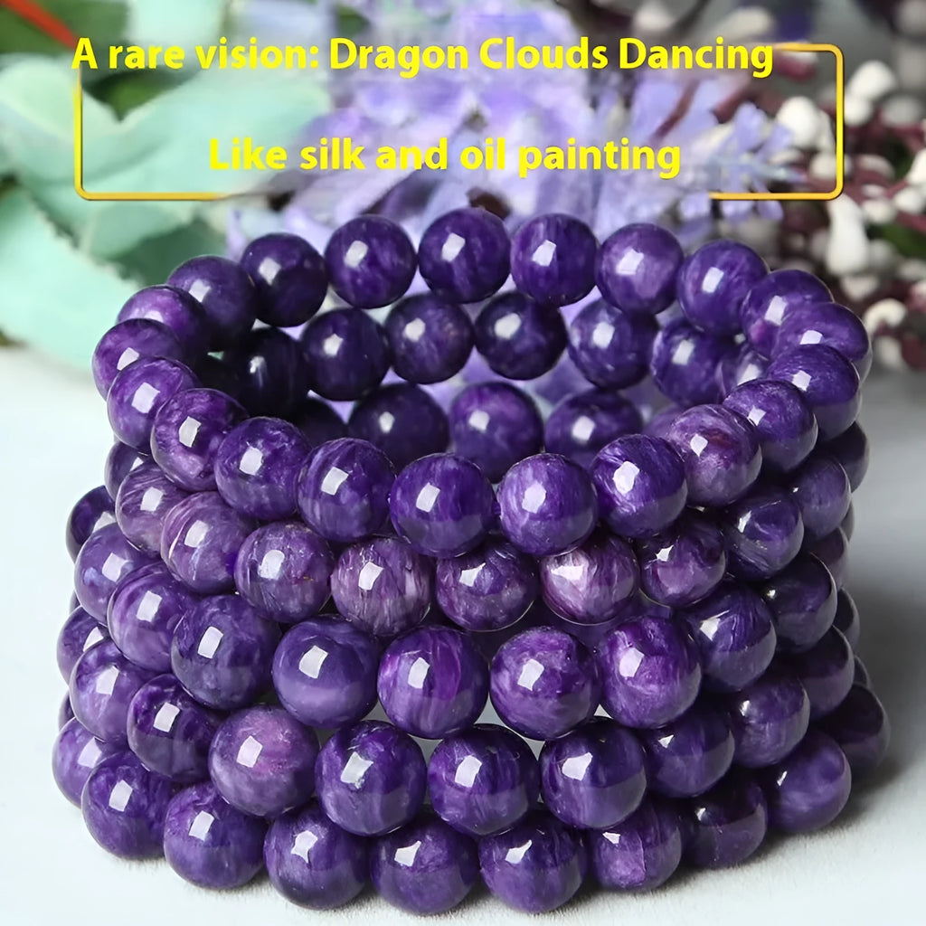 Natural purple charoite crystal bracelet with platinum details, showing different bead size options.