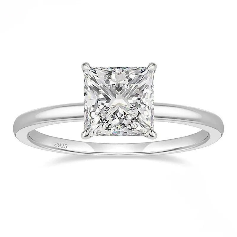 Polished 925 silver geometric simple ring for women on a white background.