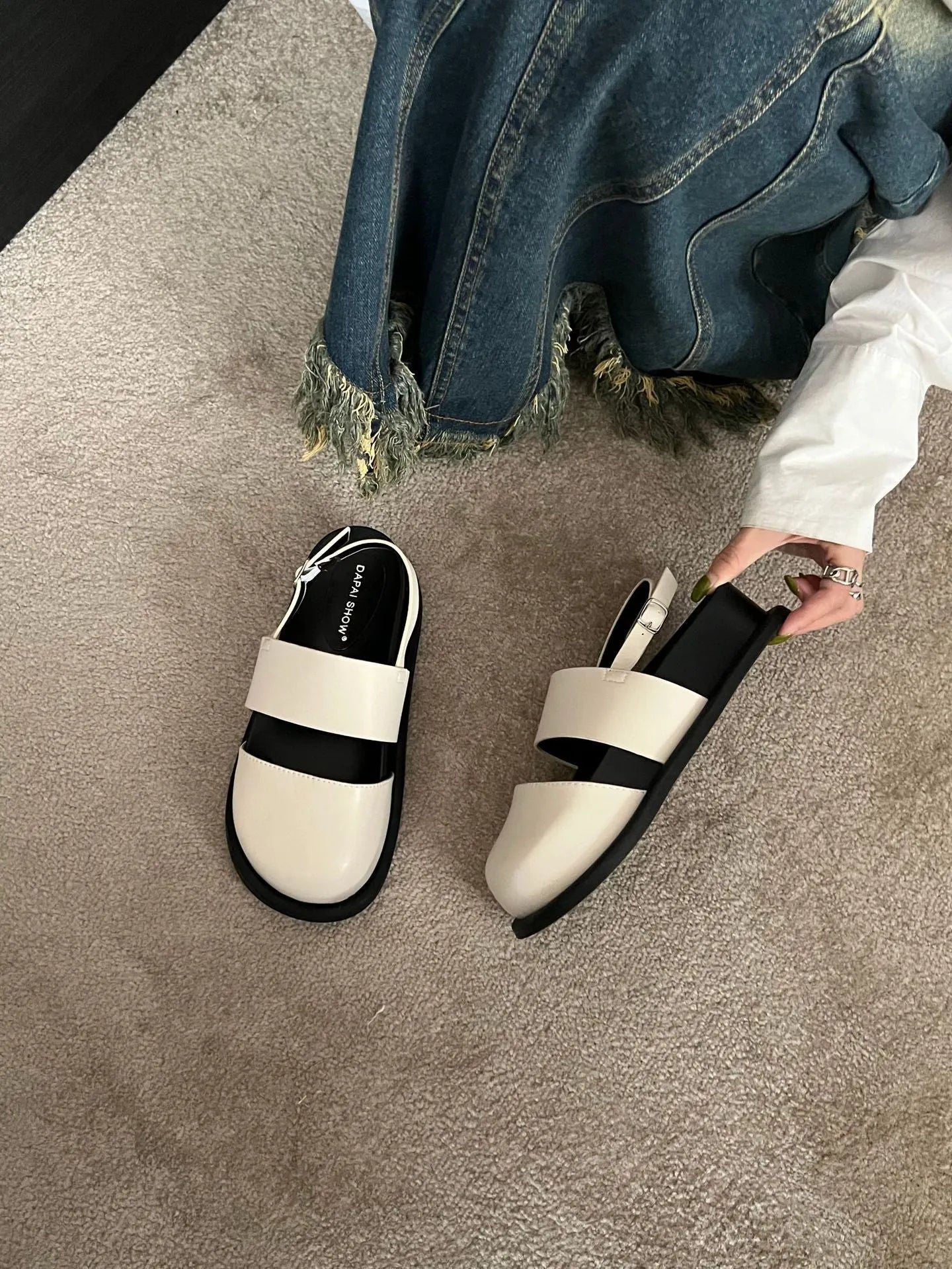 Retro closed toe sandals with raised bottom, ankle strap buckle, and round toe in apricot colour