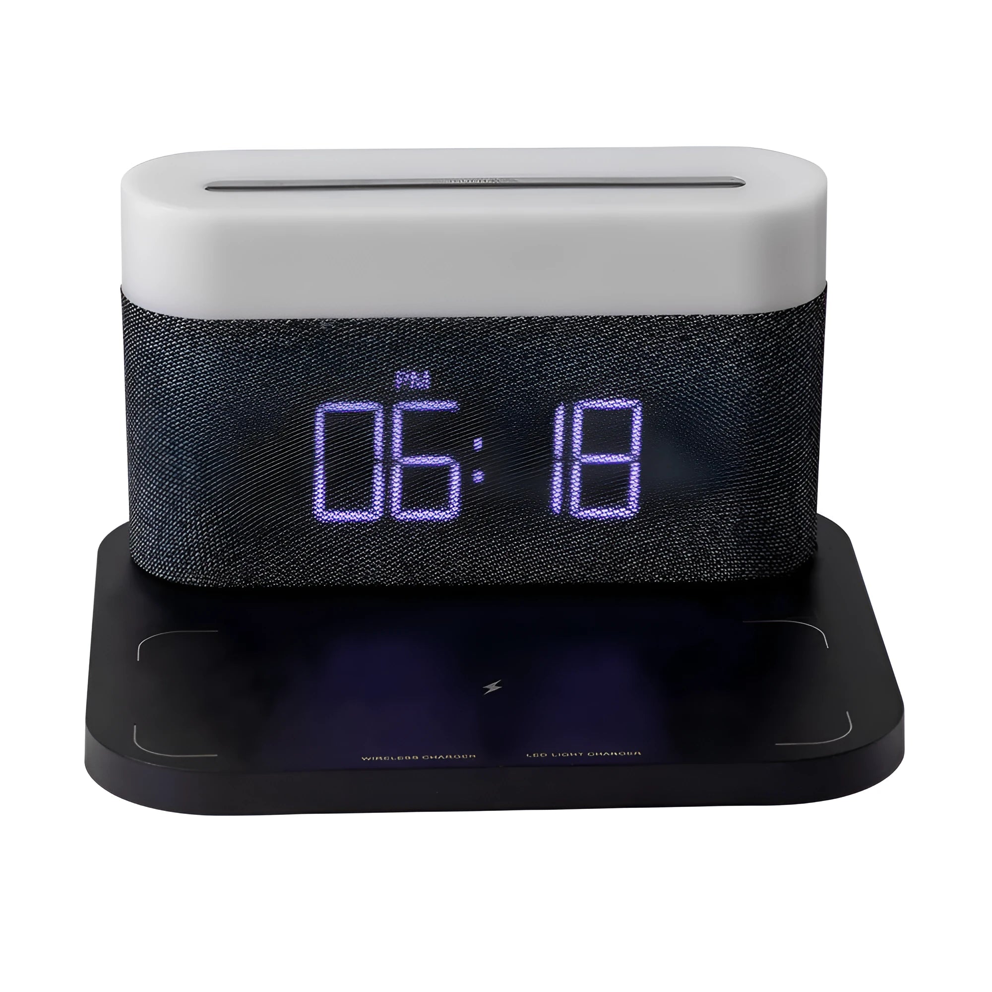 White wireless charging desktop clock with LED display and foldable stand on a wooden desk.
