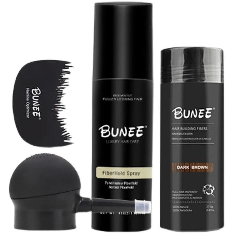 Box containing dense hair fibre powder canister, special applicator nozzle, and shaping spray bottle for hair styling.