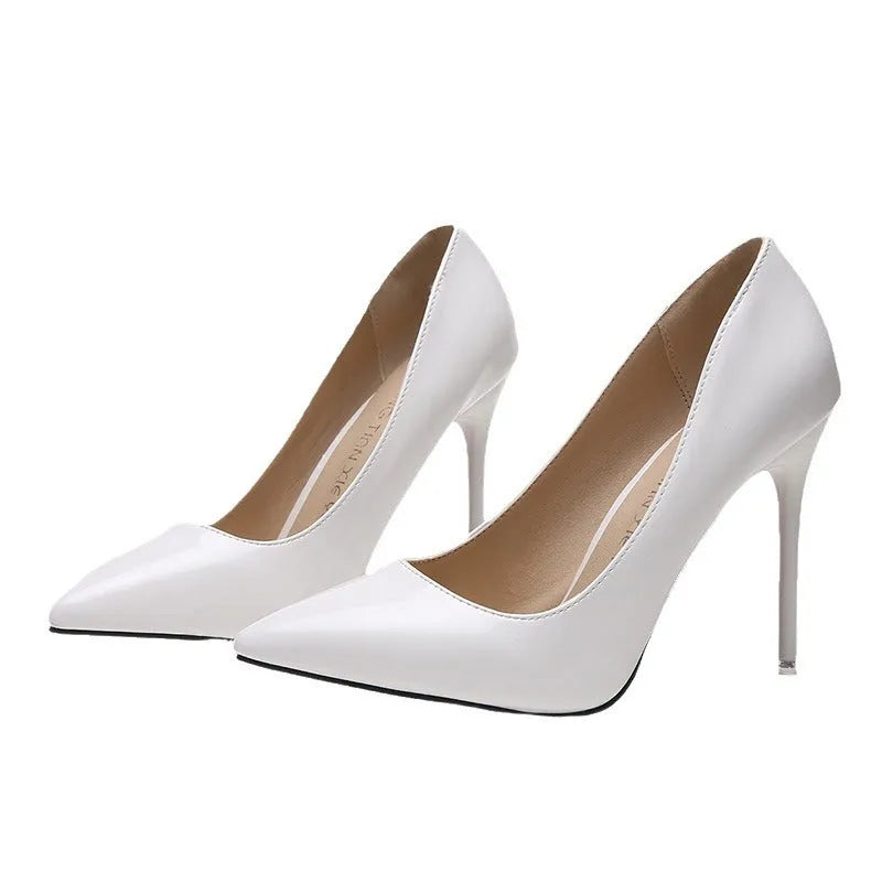 Women's pointed-toe stiletto heel pumps in apricot colour with a super high heel.