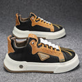 Men's beige low-top casual sneakers with an elastic band fastener and round toe.
