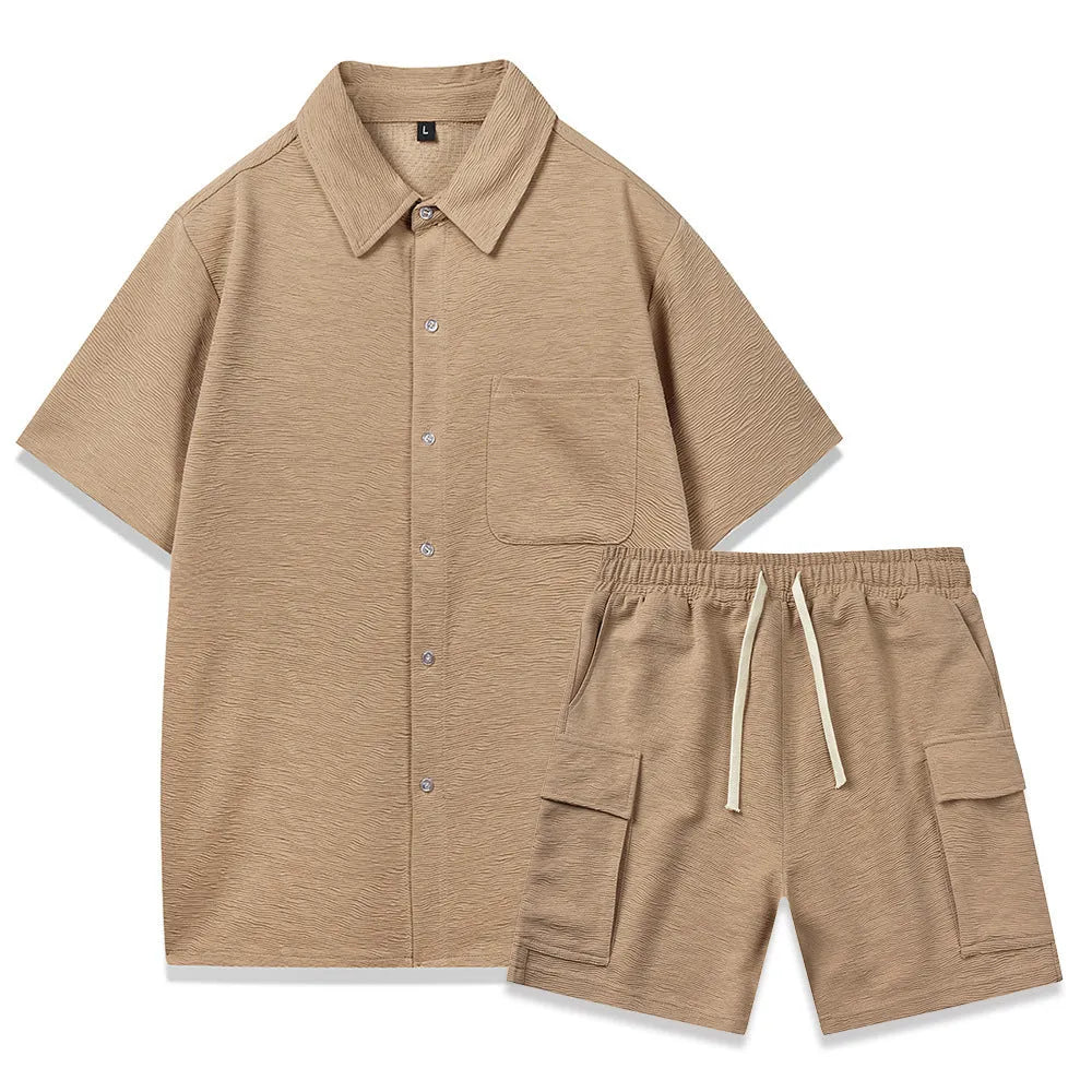 Women's beige polyester two-piece set with short sleeve top and elastic waist shorts laid flat.
