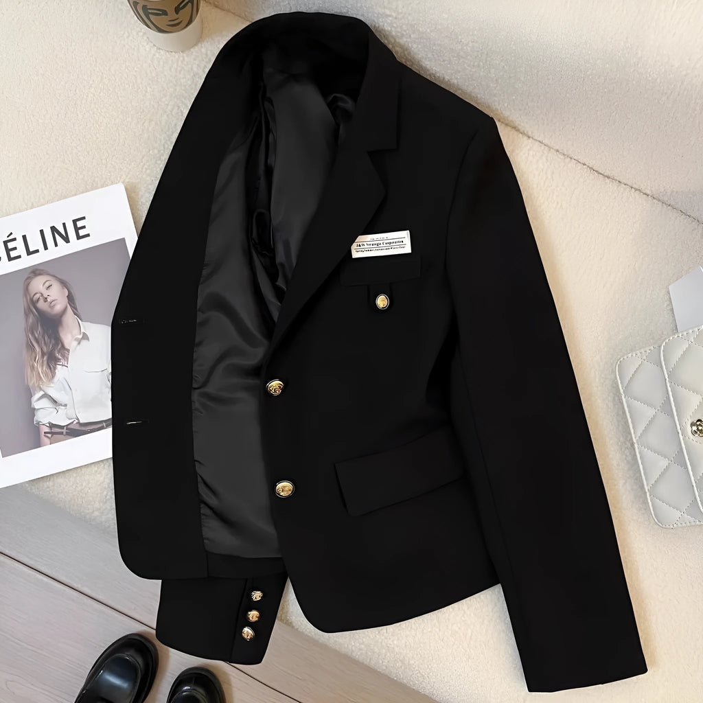 Women's black loose fit short suit coat with front pockets and regular long sleeves
