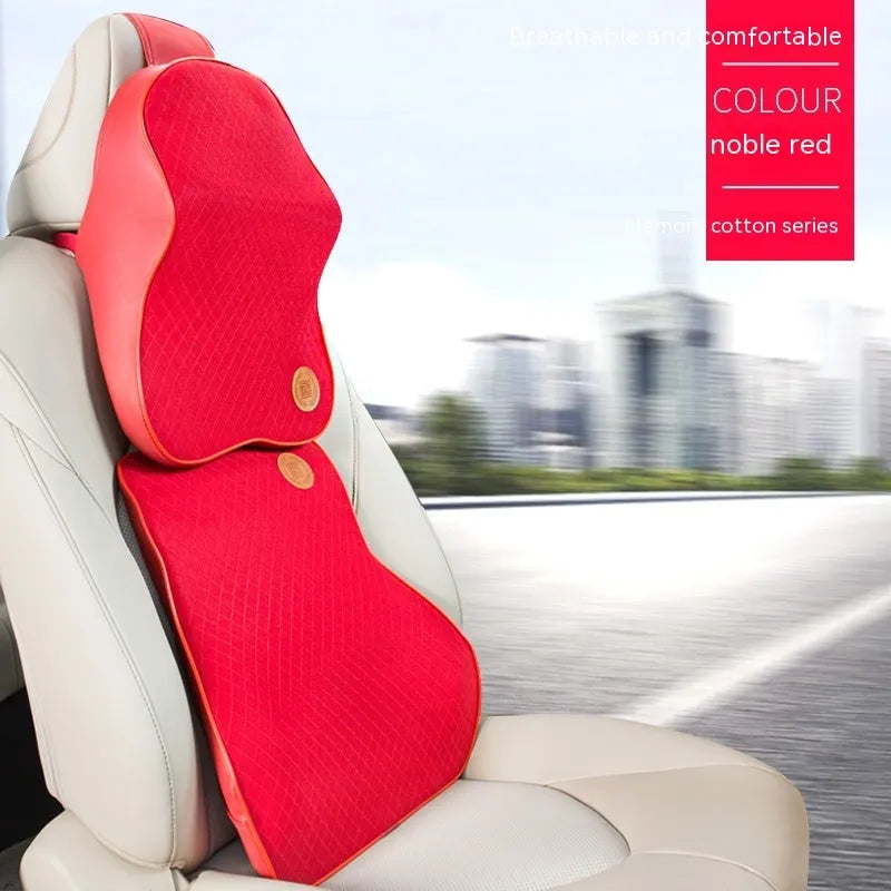 Black and brown memory foam car headrest pillow and lumbar support cushion set on a car seat.