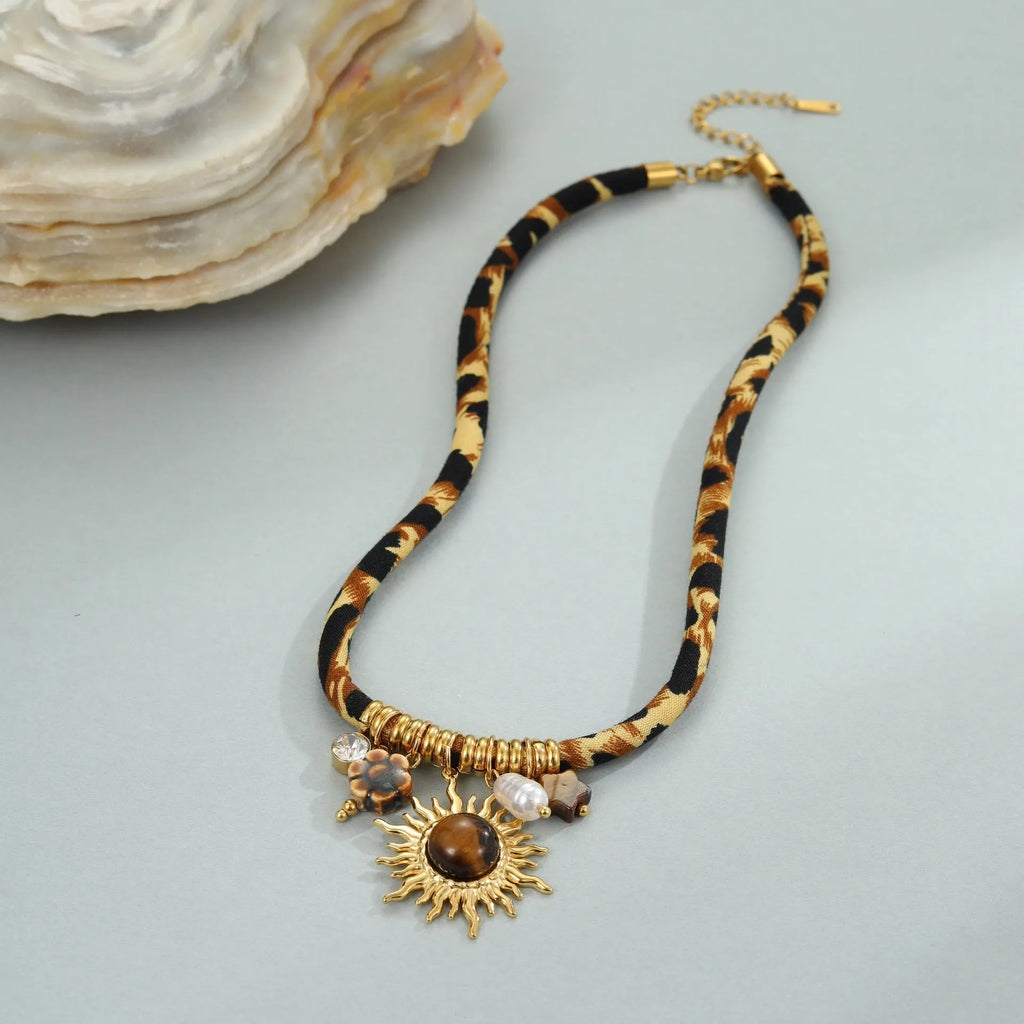 Leopard print stainless steel necklace with geometric pendant on adjustable 41-50cm chain