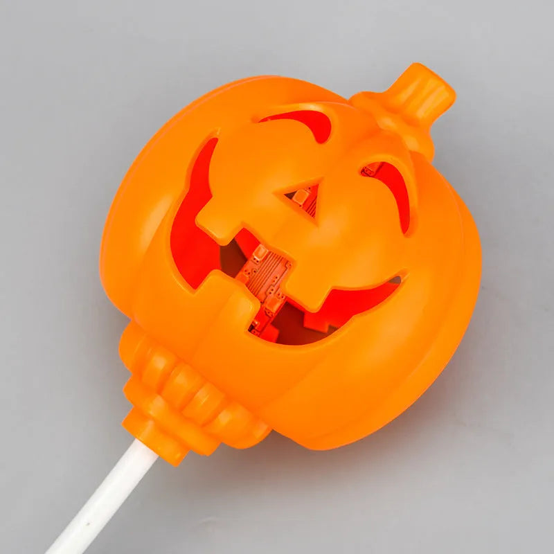 Purple and yellow light USB rechargeable plastic pumpkin lamp for Halloween decoration.