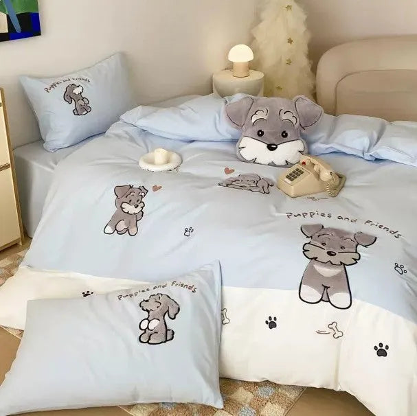 Schnauzer dog cartoon embroidered cotton bedding set with quilt cover, sheet, and pillowcases on a bed.
